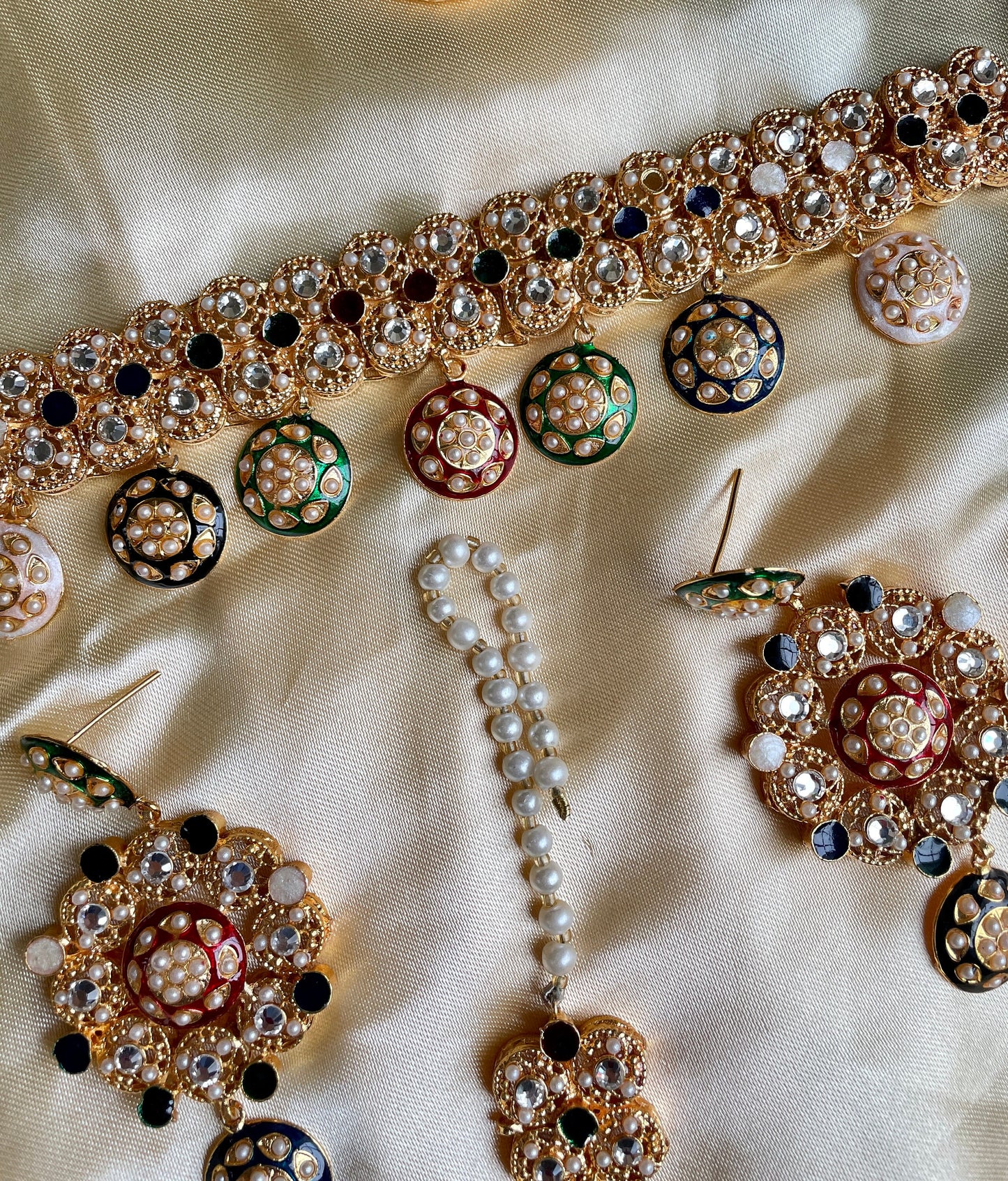 Multi color gold choker with tikka
